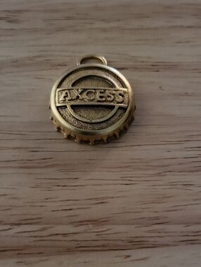 Axcess Gold-tone Bottle Cap Charm Pendant